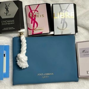 Dolce and Gabbana light blue bag with samples for her.￼